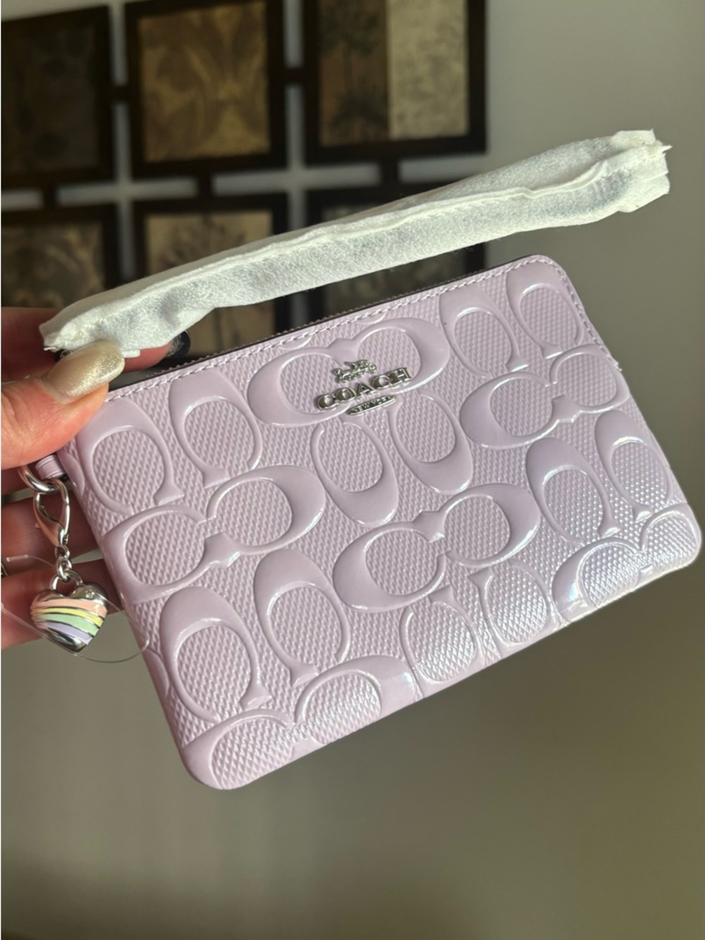Authentic COACH patent signature leather zip top wristlet with a heart charm